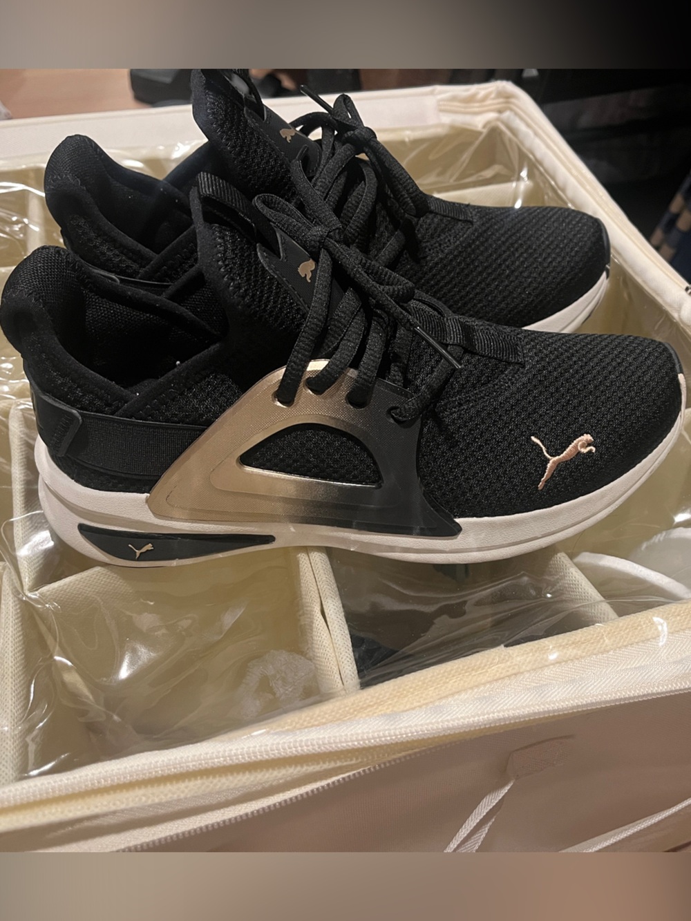 Puma  Black Sneakers with Metallic Gold Accents